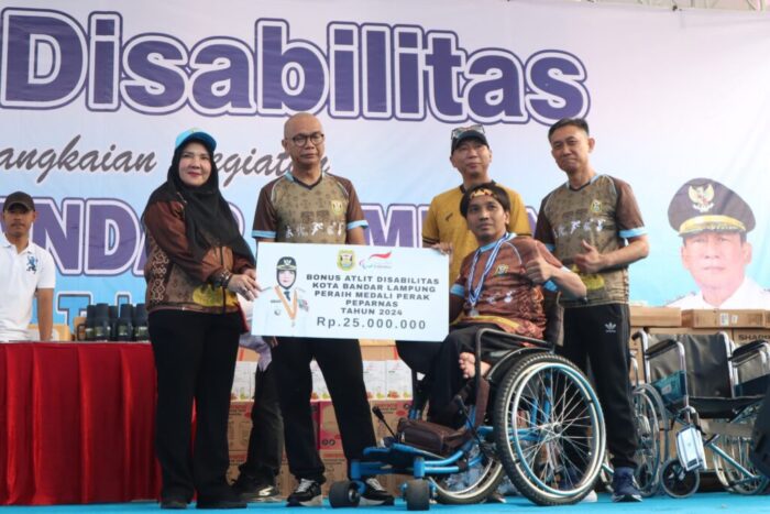 Pemerintah Kota Bandar Lampung Mendapatkan Rekor Muri Setelah Menggelar Jalan Sehat Dan Senam Disabilitas